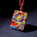 Cinnabar Fire Phoenix Thangka Pendant showcasing vibrant colors and intricate details, symbolizing rebirth and good luck.